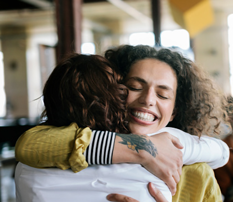 Women embracing