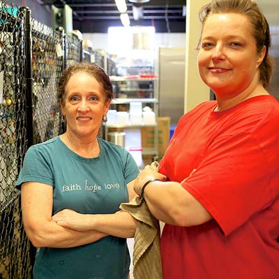 FFM staff memebers Nina and Belinda pose for a picture during a baking session.